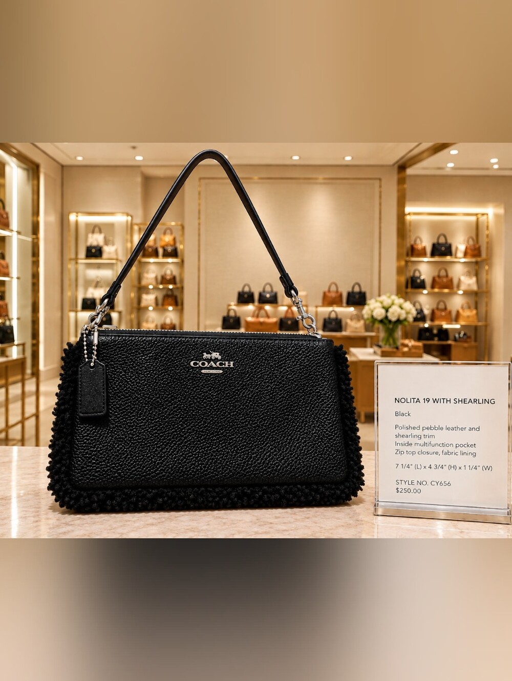 CCoach Black Pebbled Leather Wristlet with Shearling Trim